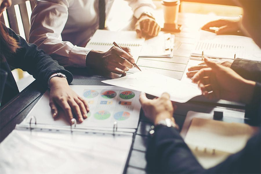 Risk Management - Group of People Gathering Together For a Business Meeting